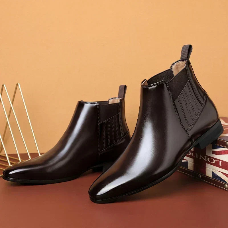 Close-up of the elastic side panels and rear pull tabs on dark brown vegan leather Chelsea boots for men