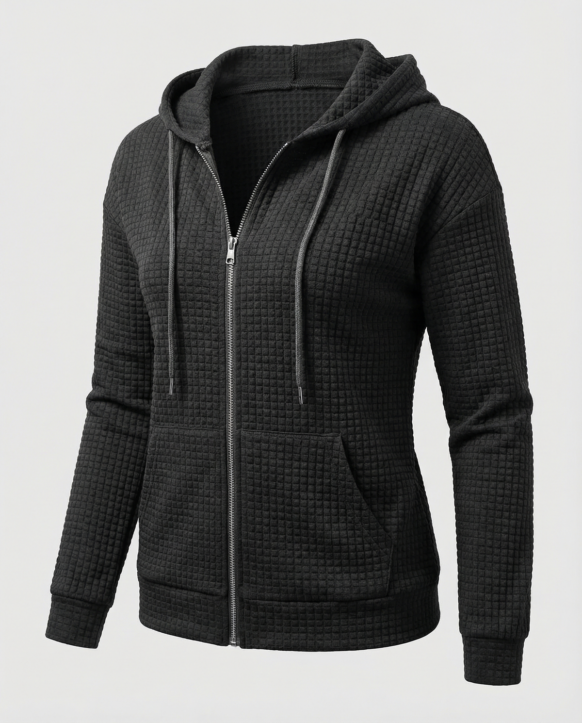 Black waffle knit zip-up hoodie for women with a fitted silhouette, drawstring hood, long sleeves, and zip front