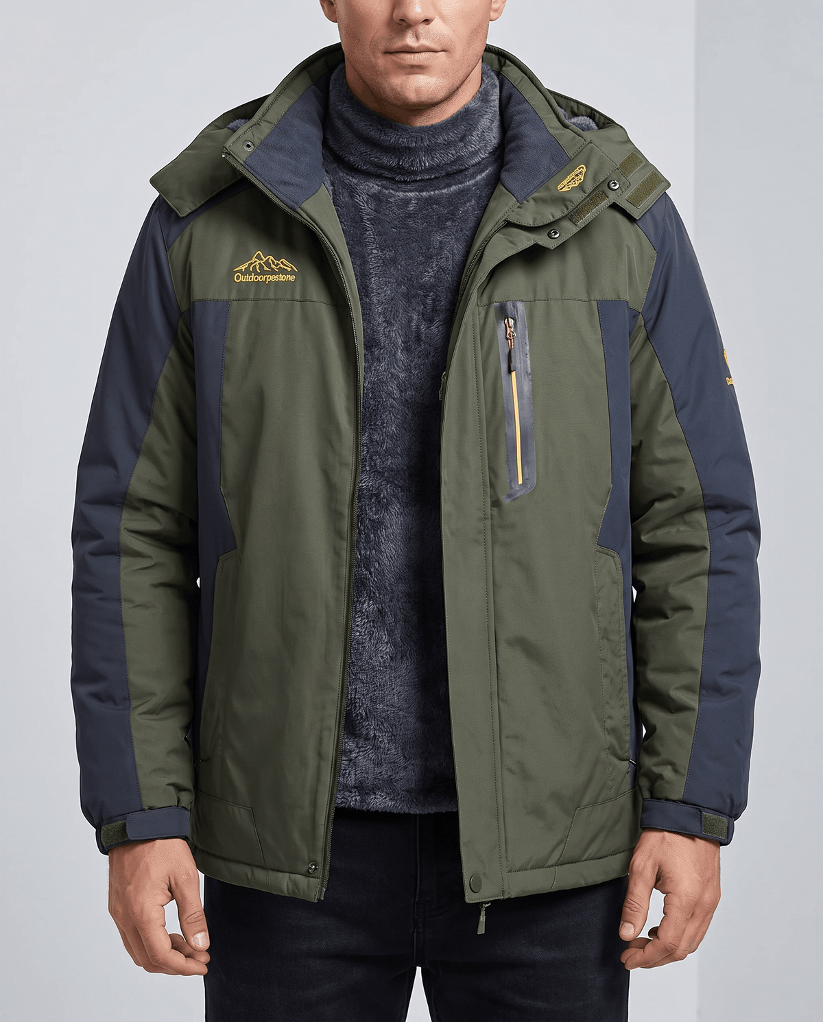 Olive green and black water-repellent hooded winter parka worn by a male model