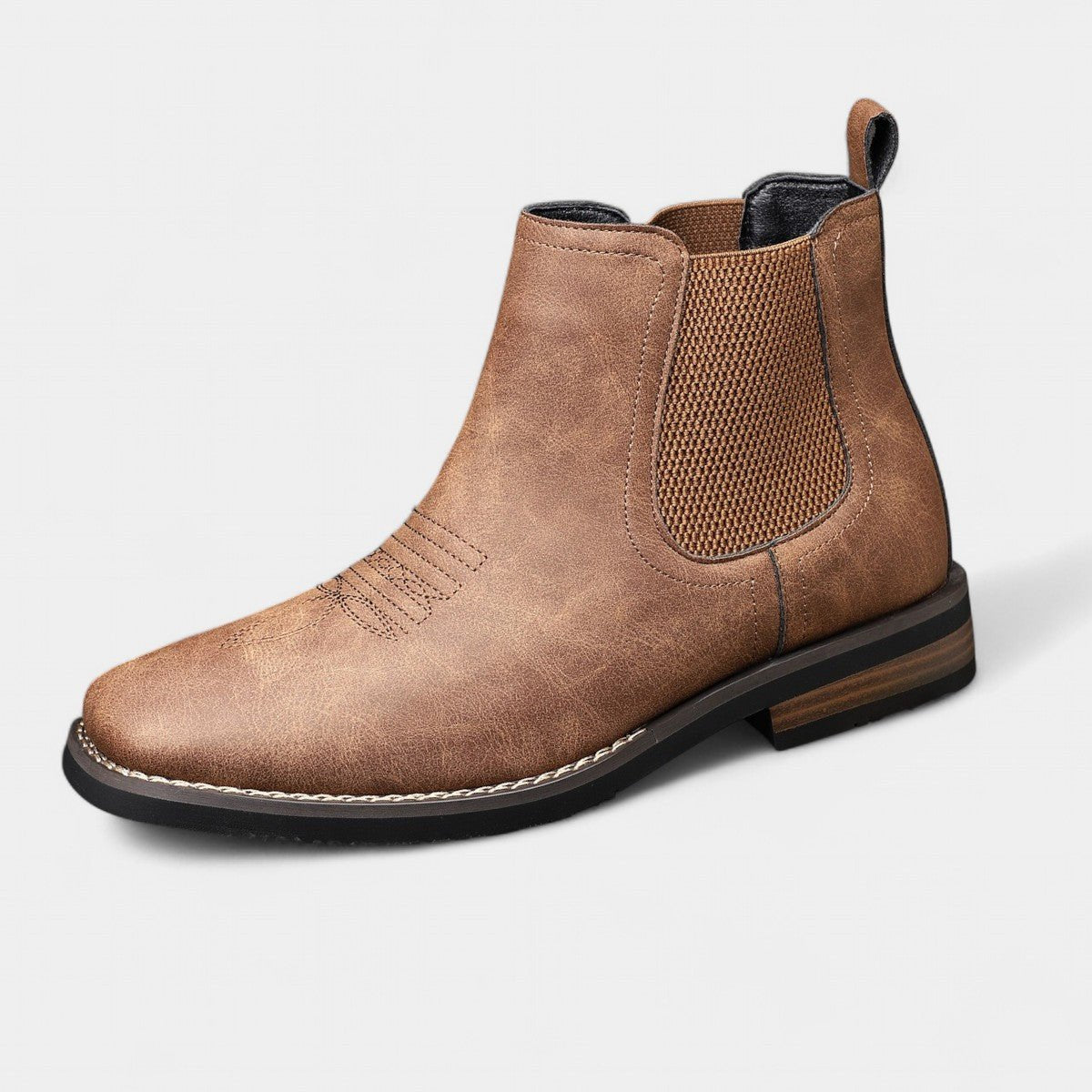 Pair of brown wide toe box Chelsea boots for men with stacked heel and elastic side panels