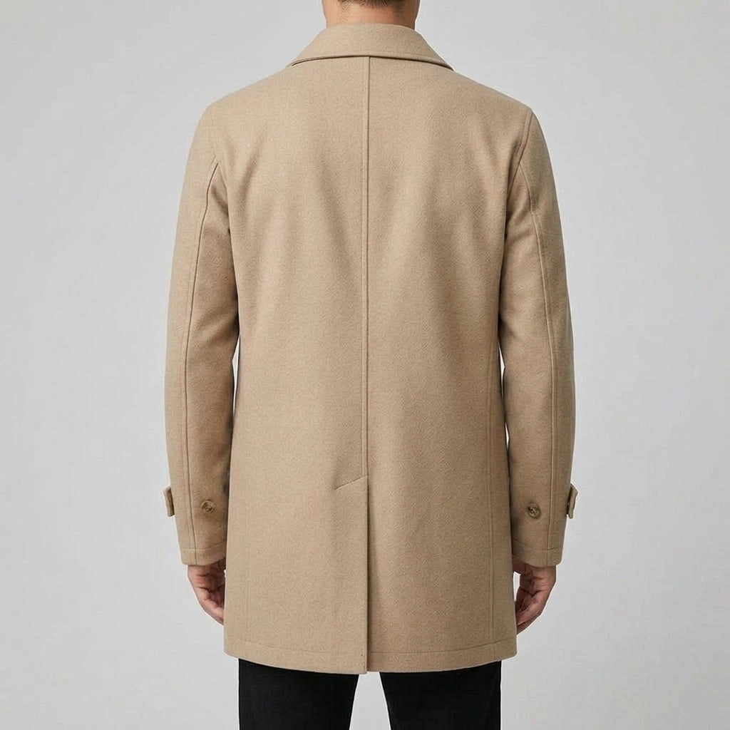 A beige wool blend mid-length trench coat with a tailored fit and weatherproof finish, shown from the back