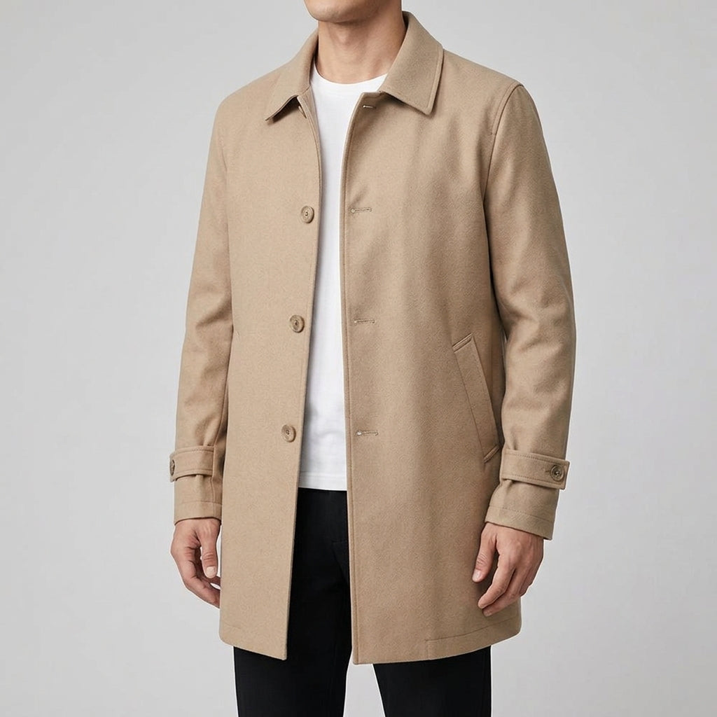 A man wearing a beige wool blend mid-length trench coat with a tailored fit and weatherproof finish